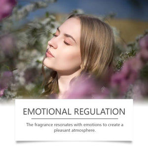 A woman with closed eyes among spring blossoms, lifestyle image for the Roxelis roll on perfume oil