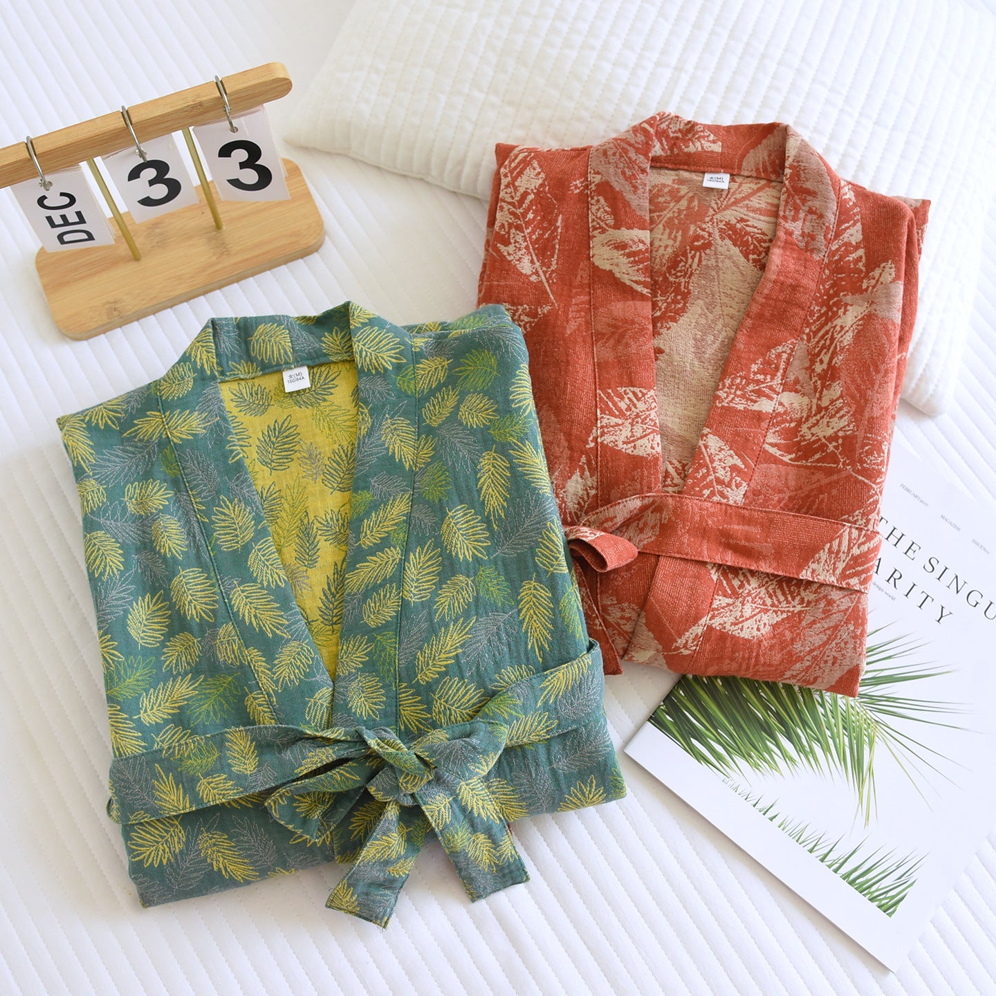 Cotton gauze kimono robe with a kimono collar, tie belt and patch pockets in a leaf print