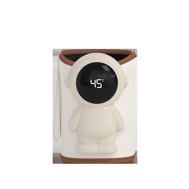 Beige baby bottle warmer sleeve with an astronaut shaped front panel and a round LED display reading 45 degrees