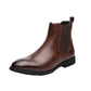 Single brown Chelsea boot in side view on a white background, elastic side panel, pull tab and black rubber sole