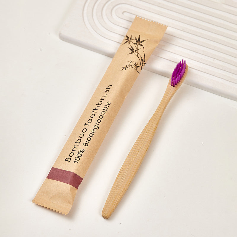 Group of bamboo toothbrushes standing with colored soft bristle heads up