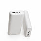 Two white power bank units on white showing the USB-A, USB-C and DC output ports beside the power button