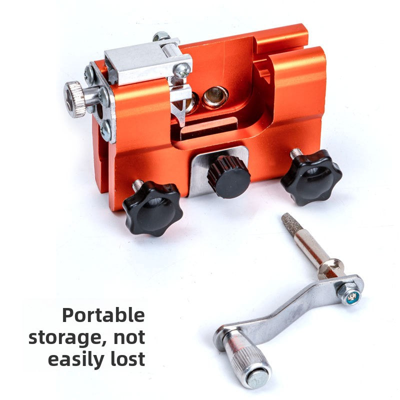 Close view of the carbide grinding head bit used in the manual chainsaw chain sharpener