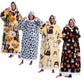 Four models wearing long hooded pullovers in dog, leopard, animal and pumpkin prints with plush hood trim