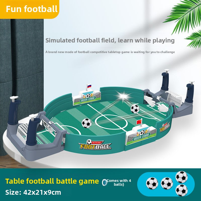 Green desktop football battle game with four balls, spring launchers and a central scoreboard