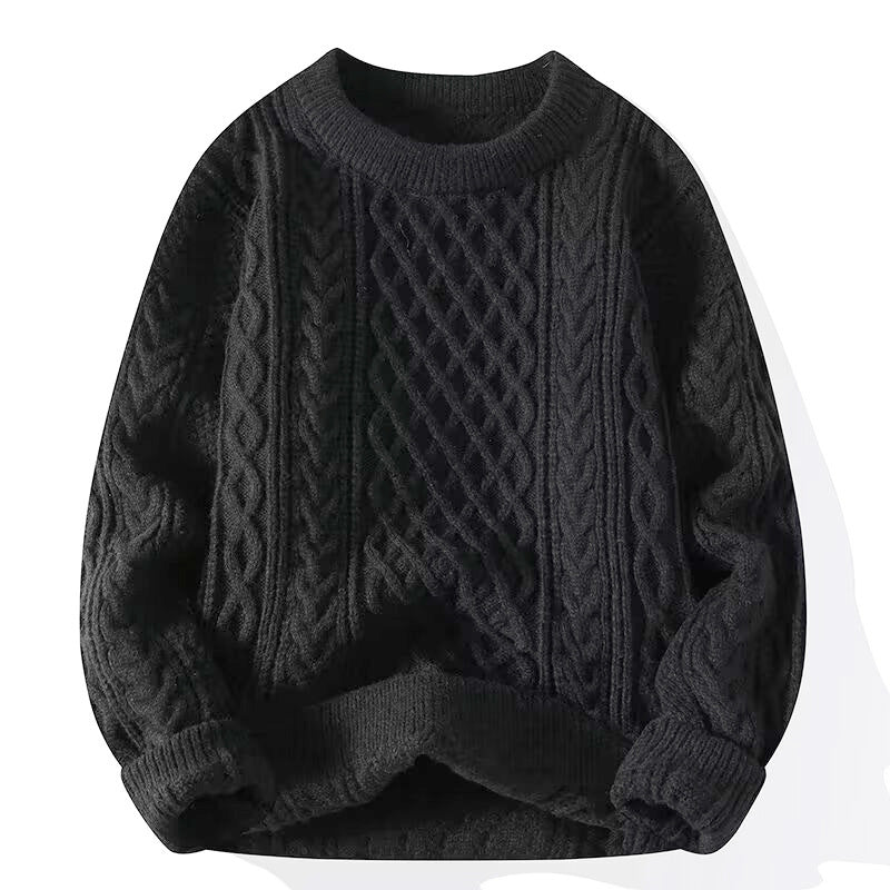 Sleeve detail of the cable knit pullover, braided cable running down to a ribbed cuff edge