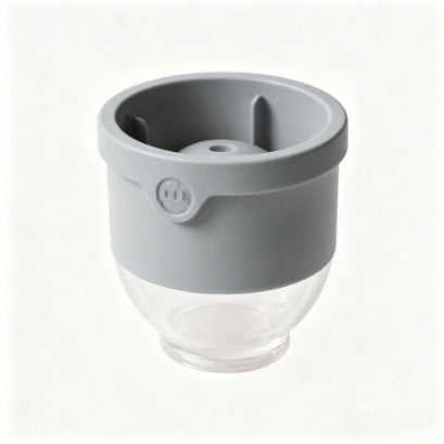 Flexible platinum silicone ice cube tray with round wells for portioning purees
