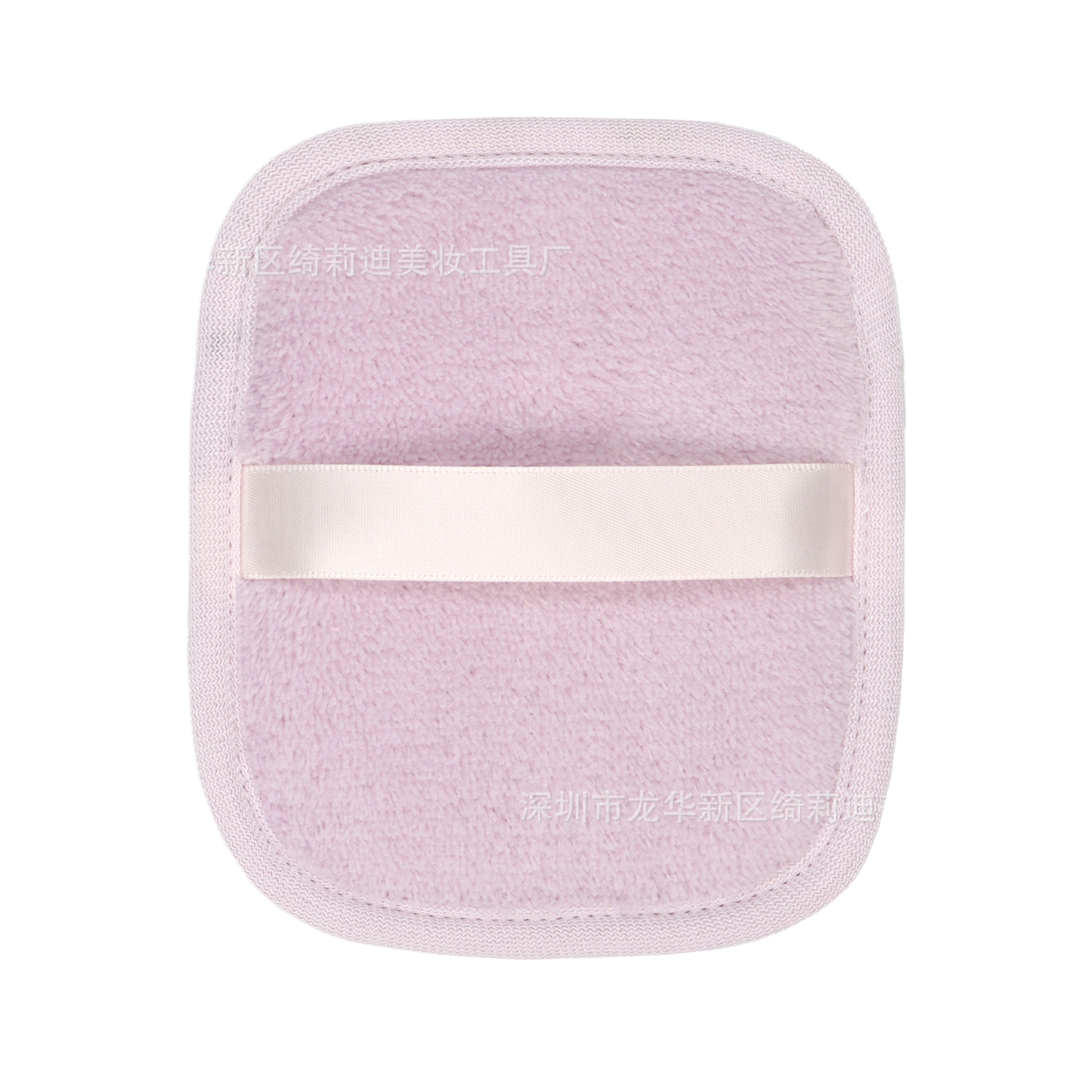 Back of a lilac reusable makeup remover pad showing the satin hand strap