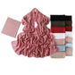 Folded jersey undercap beside a rose modal rayon hijab scarf on a wooden hanger with a color stack