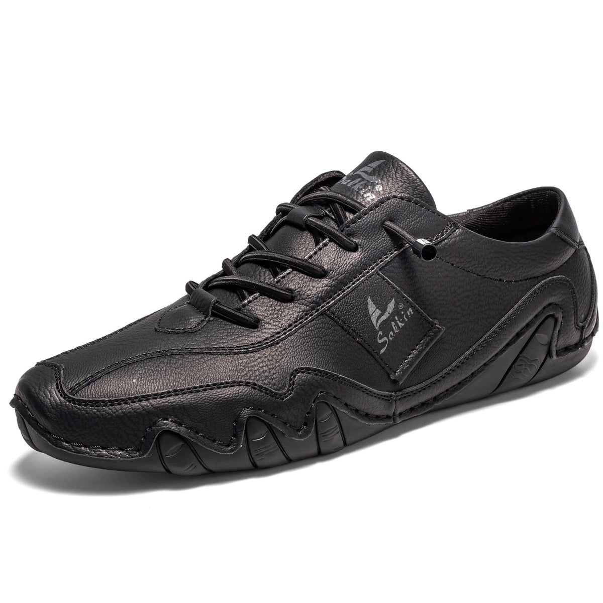 Black microfiber low-top lace-up casual shoe with a wavy cream lug sole, three quarter view, size option 49