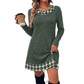Grayish green ribbed knit mini dress with round neck and plaid trim, model holding a coffee cup