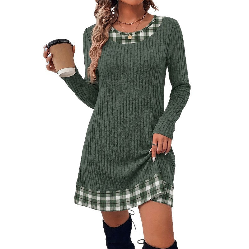 Grayish green ribbed knit mini dress with round neck and plaid trim, model holding a coffee cup