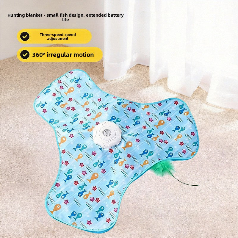 Blue small fish print three lobed cat teaser mat on carpet with motor puck and green feather wand