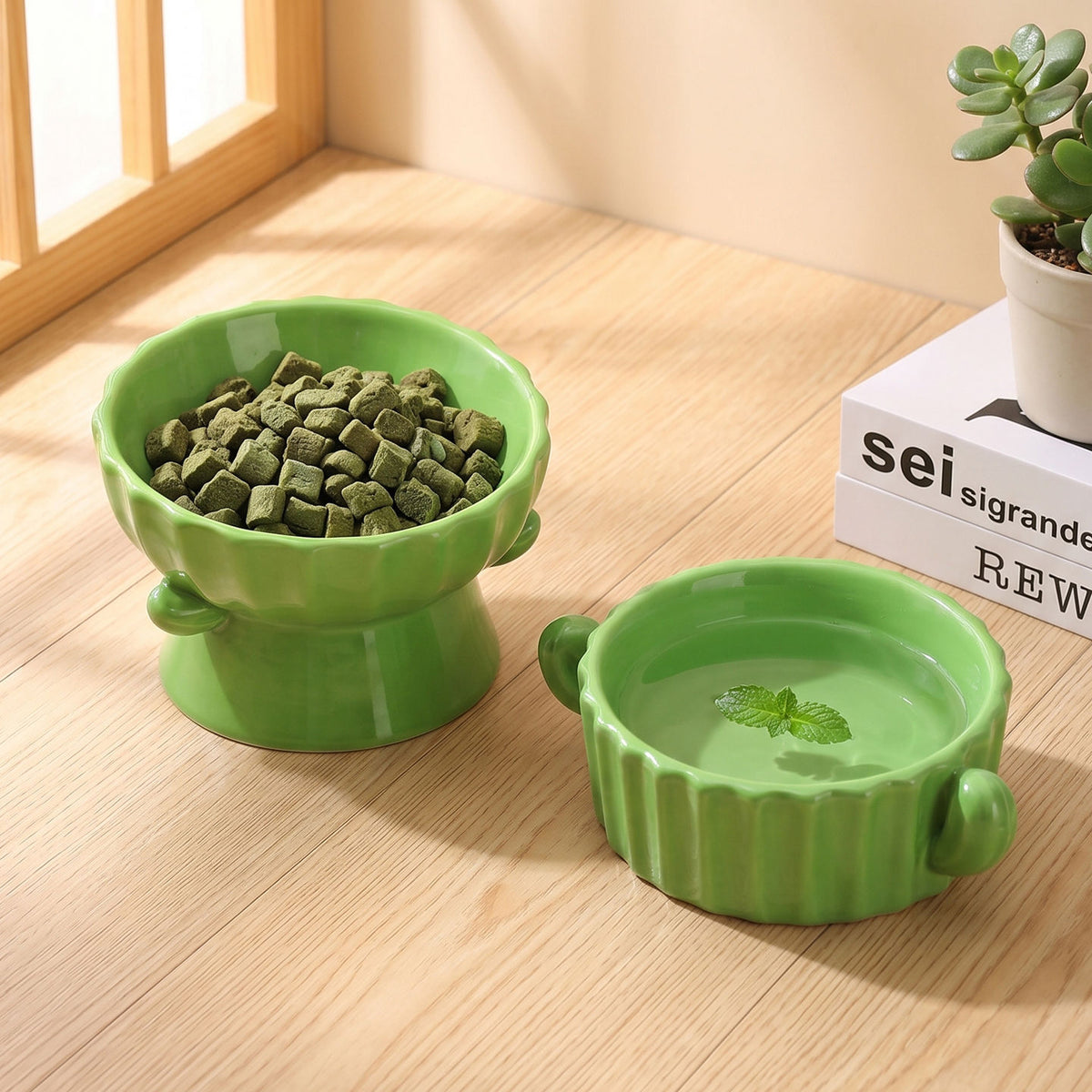 Green scalloped raised bowl of treats beside a water bowl with a mint leaf, a styled scene not among the listed designs