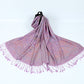 Lavender paisley jacquard scarf hanging from a ring and spread out with twisted lilac tassel fringe