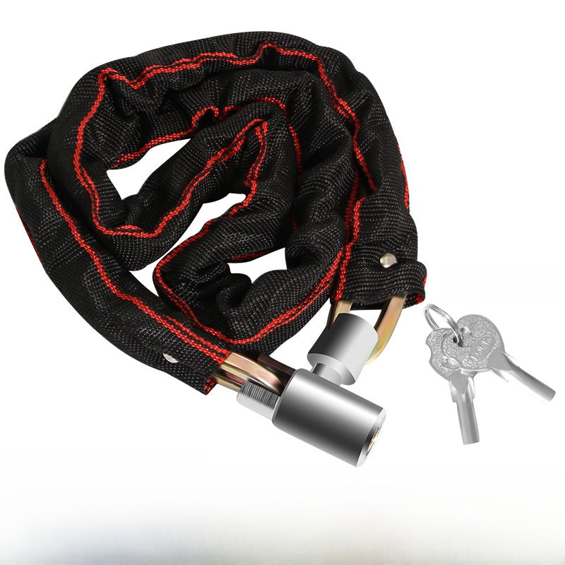 Close detail of the keyed barrel lock and fabric sleeve on the bike chain lock