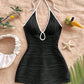 Halter neck bodycon romper in white rippled stretch fabric with a self tie bow and keyhole cutout