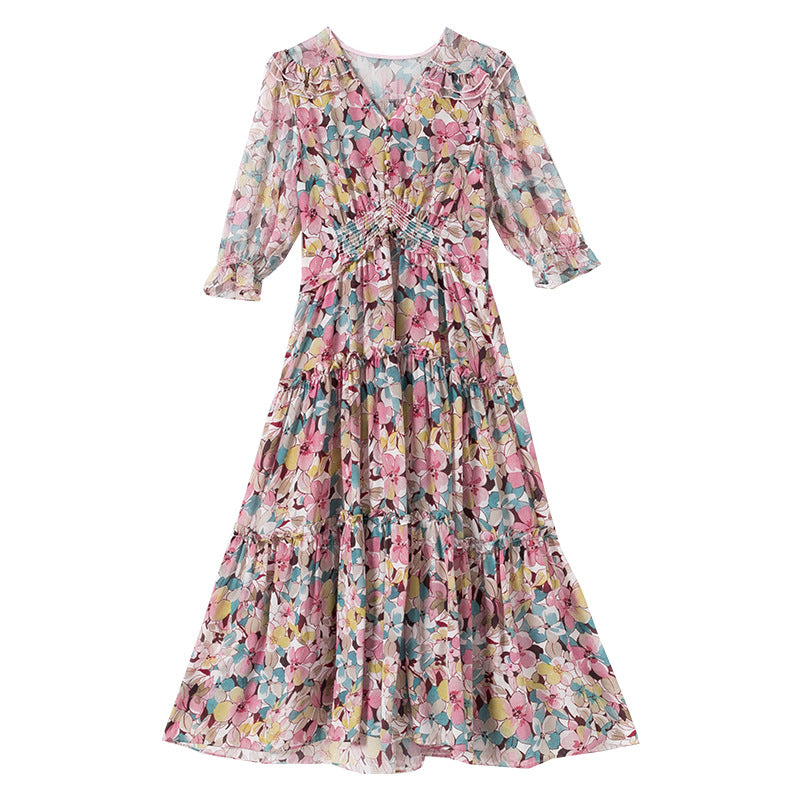 Printed mulberry silk dress styled in a modern interior scene