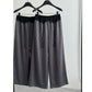 Two gray wide-leg pants on black hangers showing lace waist and drape
