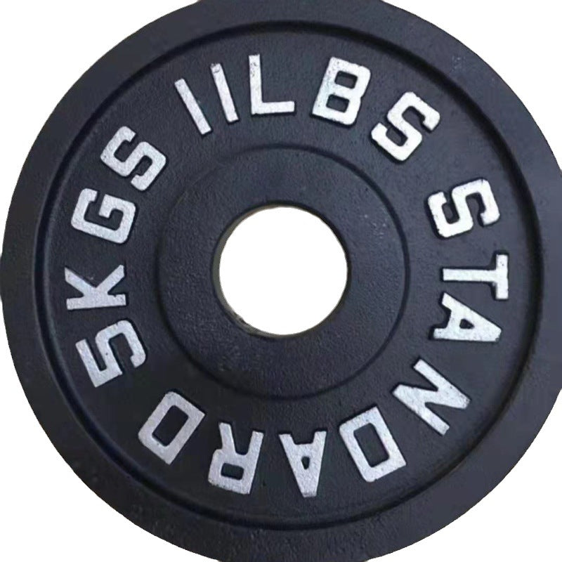 Cast iron barbell plate angled to show the textured edge and center sleeve hole