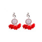Handmade bohemian clip-on earrings with tassel and bead drop detail, zinc alloy frame, studio shot on white background