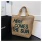 Embroidered woven cotton shoulder bag front panel with hand-stitched colorful embroidery