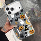 Clear moon ghost Halloween iPhone case held in hand showing the raised camera cutout and silver back