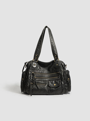Vintage style PU motorcycle bag in black shown front view