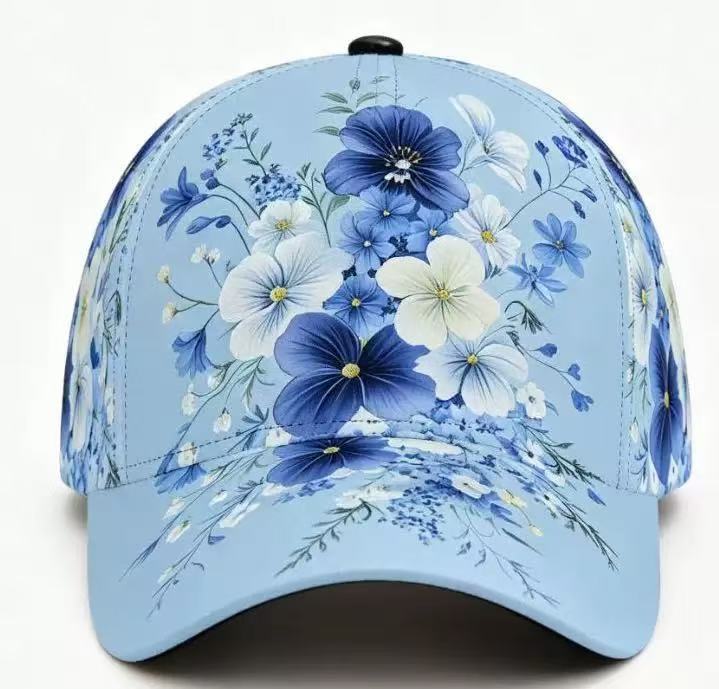 Curved brim adjustable cap covered with a printed garden flower design