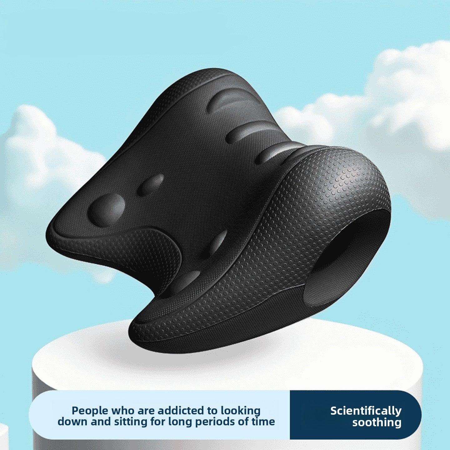Jet black moulded EVA neck rest on a white plinth against a blue sky backdrop