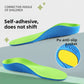 Childrens cushioned PU arch support insole, breathable green top over a blue foam base, angled view