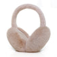 Beige plush foldable earmuffs with a plush headband on a white background