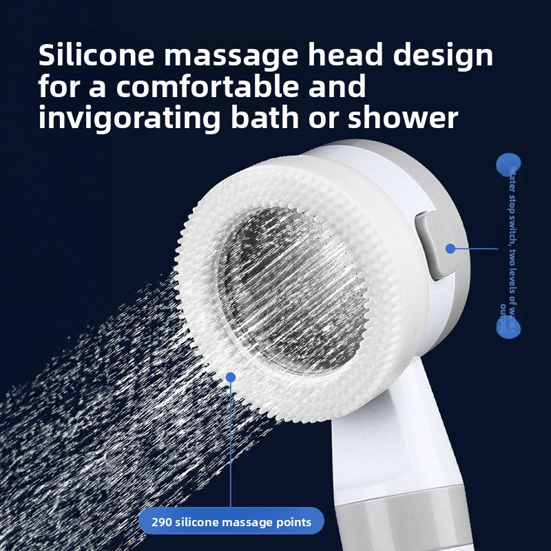 Close view of the silicone shower head spraying water through 290 soft massage points