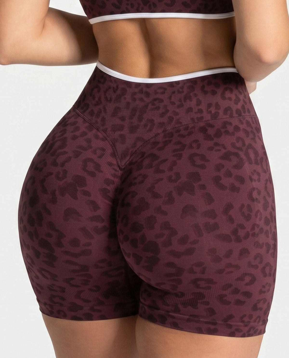 Burgundy seamless high waist yoga shorts with a 3D leopard print and ribbed waistband, size S variant image