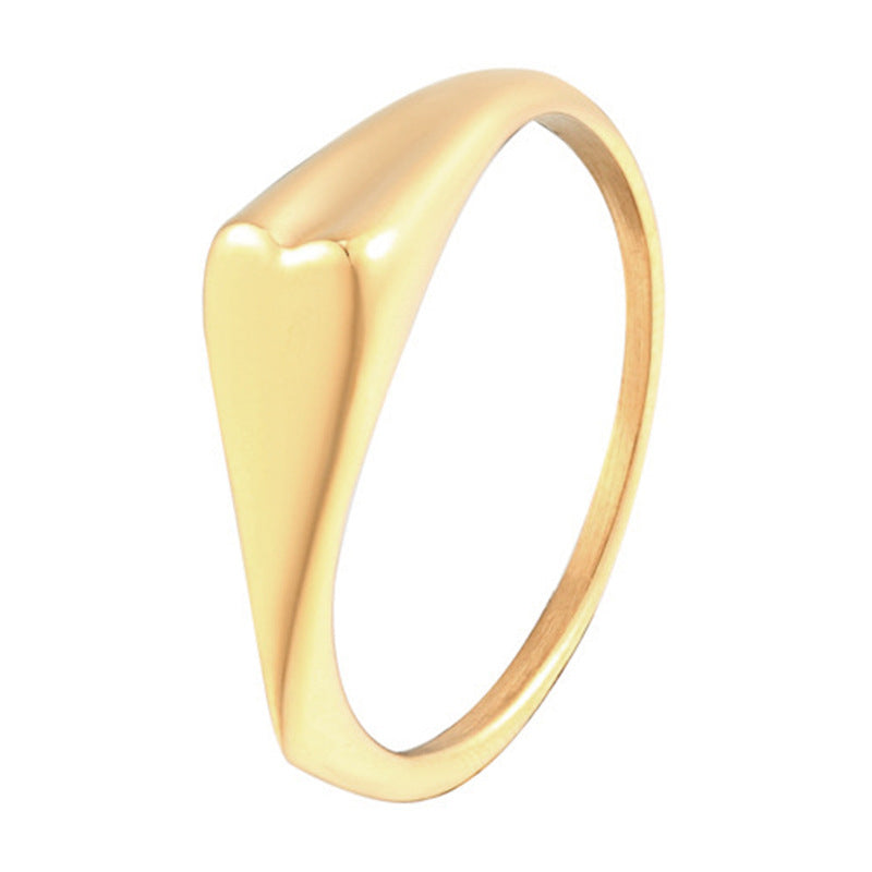 Heart titanium steel ring worn on a finger showing the raised heart accent
