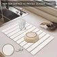 Foldable diatomaceous earth absorbent mat with a slatted design for bath and kitchen