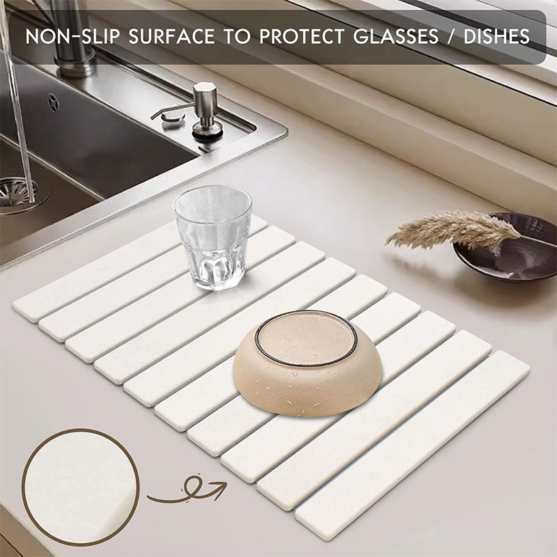 Foldable diatomaceous earth absorbent mat with a slatted design for bath and kitchen