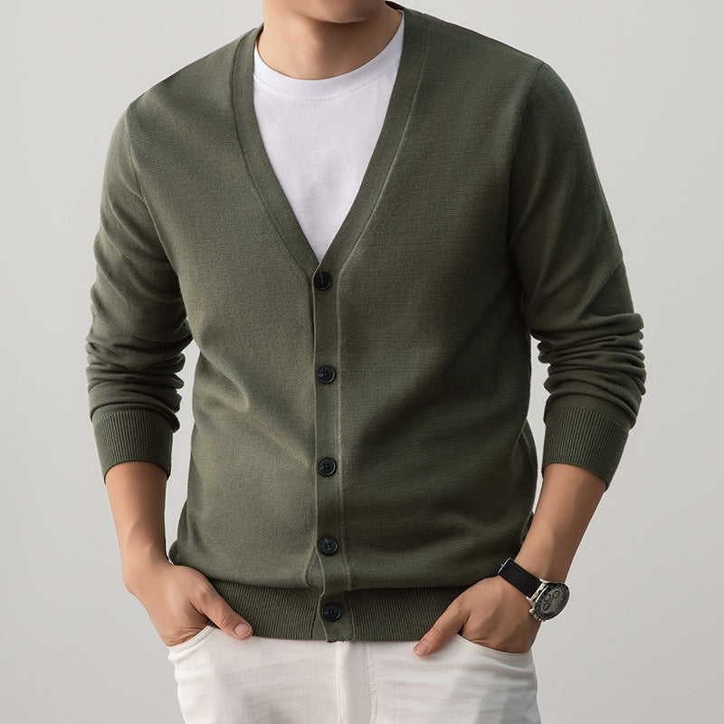 Black mens knit cardigan buttoned to show the fine knit and ribbed hem