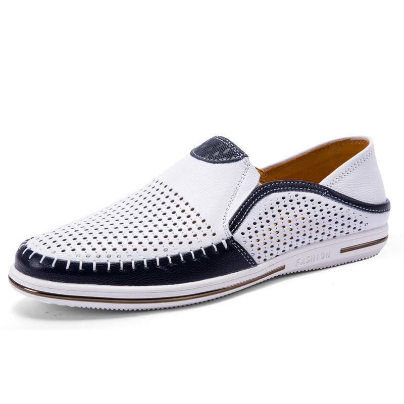 Slip on cowhide leather loafer shown on foot with cropped trousers on a paved street
