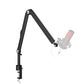 Black aluminum microphone boom arm curved down toward a ghost mic, clamp fixed at the desk edge