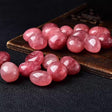 Red strawberry crystal rolling stone