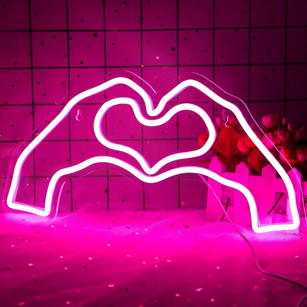 LED neon wall light sign, lit above a bed