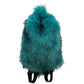Plush fur travel backpack styled in a modern interior scene