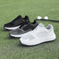 Close view of a mens golf shoe outsole showing the replaceable metal spikes