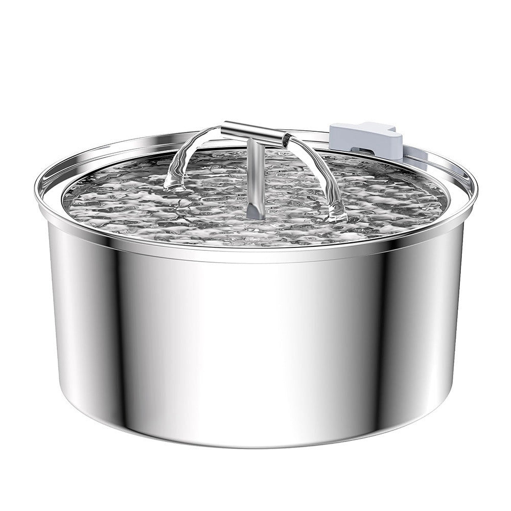 Overhead view of stainless steel pet fountain tray with rippling circulated water