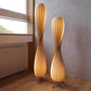 Top down view of the spiral wood slat shade showing its twisted petal shape