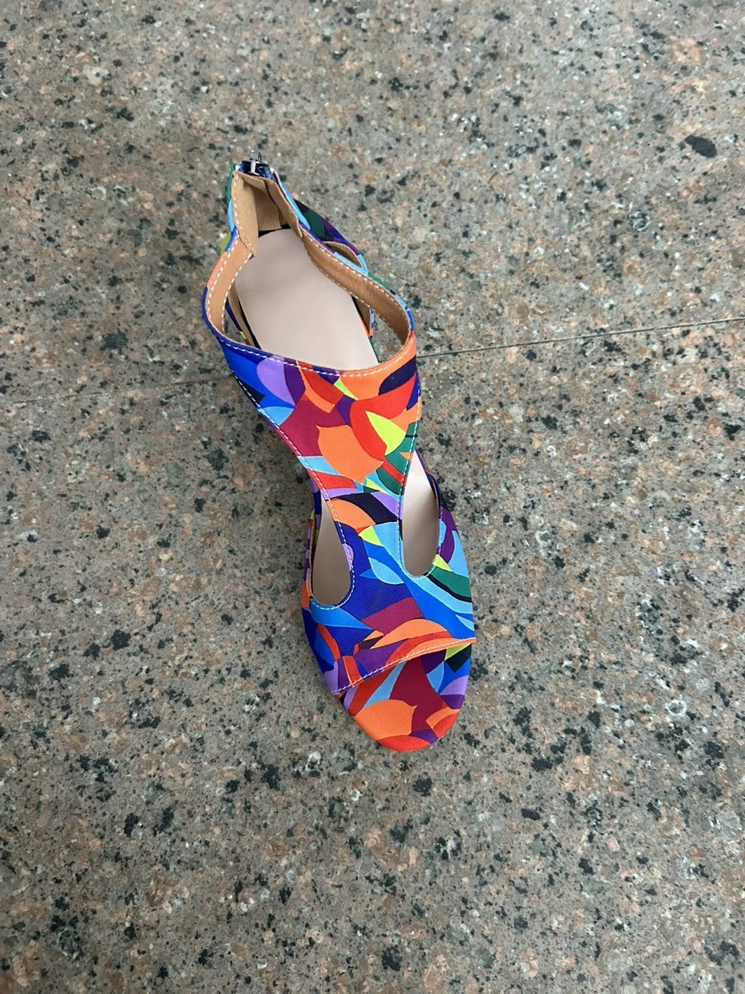 Multicolor print T-strap peep toe sandal with rear zipper on a gray stone ground, EU 36 option