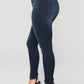 Dark blue stretch skinny jeans, side view of the contoured hip and seat on model