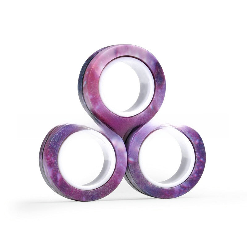 Magnetic fidget rings shown in a striped color finish