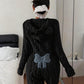 Black plush hooded romper with a blue bow patch on the back, size L option photo